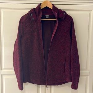 Red and black Eddie Bauer zip up jacket with plaid detailing.